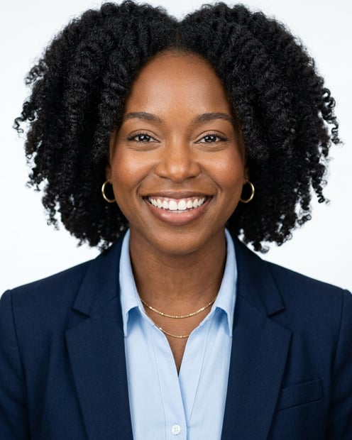 White / Pure White Studio · Navy blazer with light blue shirt headshot example