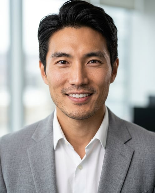 Office / Modern Office Workspace · Light gray blazer headshot example