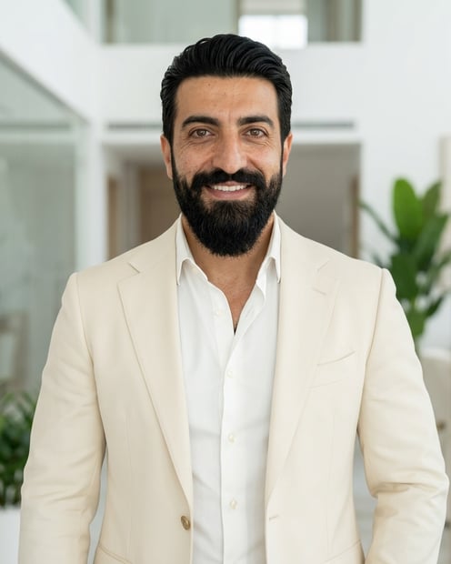 Minimalist Contemporary Home · Cream Blazer headshot example