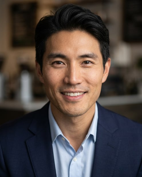 Cafe · Navy blazer with light blue shirt headshot example