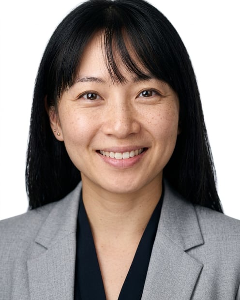 White / Pure White Studio · Light gray blazer headshot example