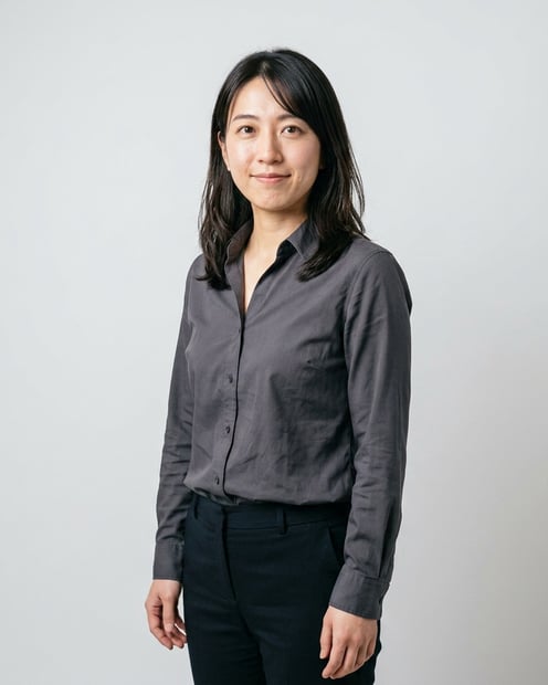 Soft White to Light Grey Studio · Charcoal Button-Up with Dark Pants headshot example