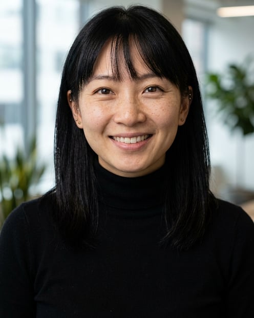 Office / Modern Office Workspace · Fitted black turtleneck headshot example