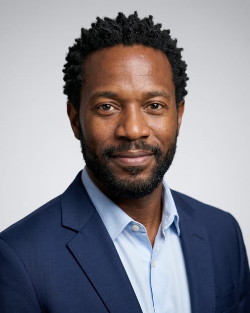 Neutral Gradient / Light Grey · Navy blazer with light blue shirt headshot example