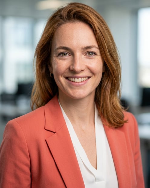 Lobby · Coral blazer over white blouse headshot example