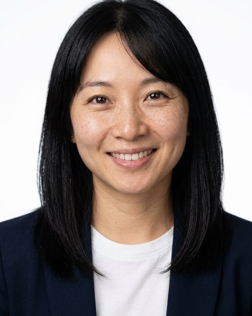 White / Pure White Studio · Open navy blazer over simple white tee headshot example