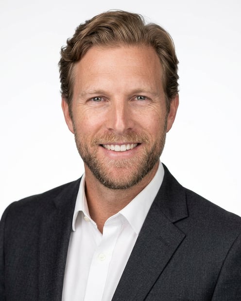 White Studio · Charcoal Blazer headshot example