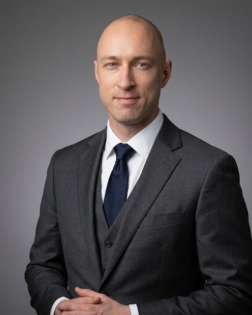 Mid Grey Seamless Studio · Subtle Premium Pinstripe headshot example
