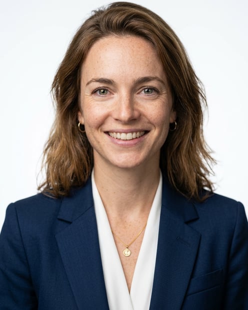 White / Pure White Studio · Dark blue tailored suit headshot example