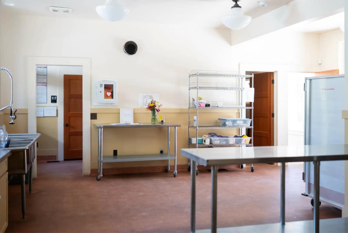 The catering kitchen at North Star House with prep counters and refrigeration