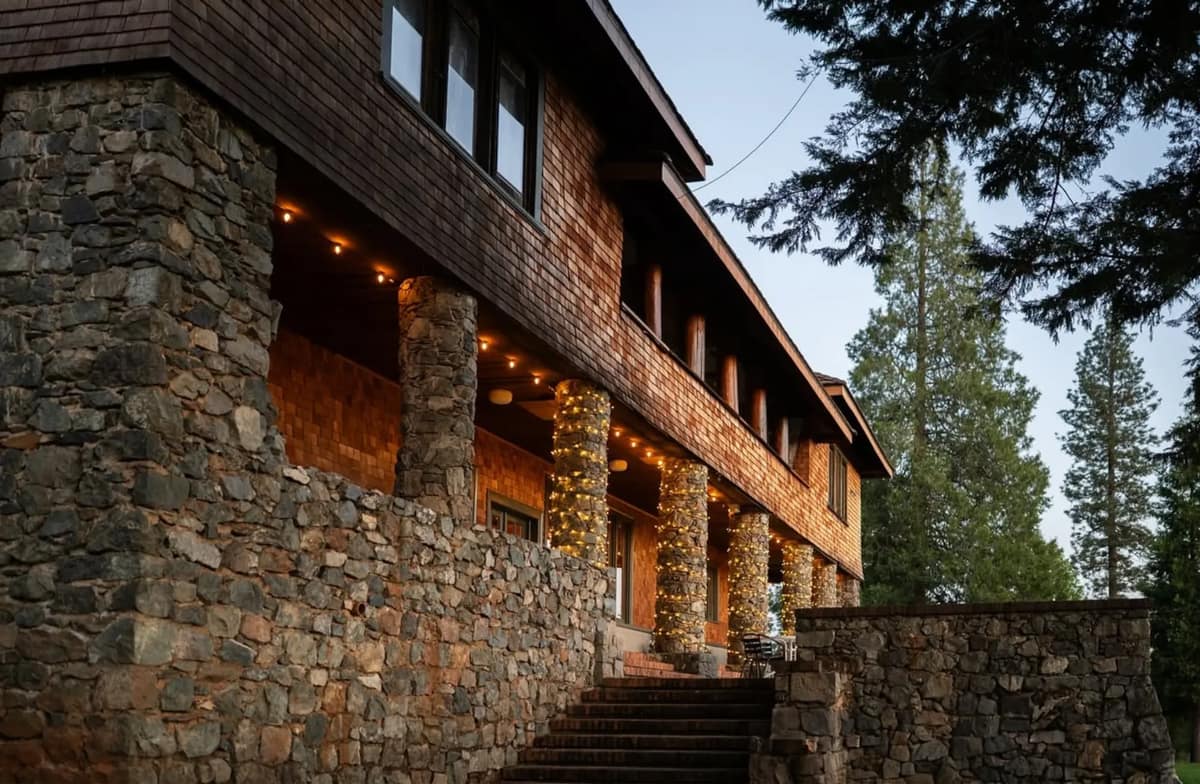 The Terrace and historic stone walls of North Star House at dusk