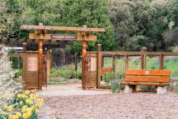 Heritage Garden entrance with flowers blooming