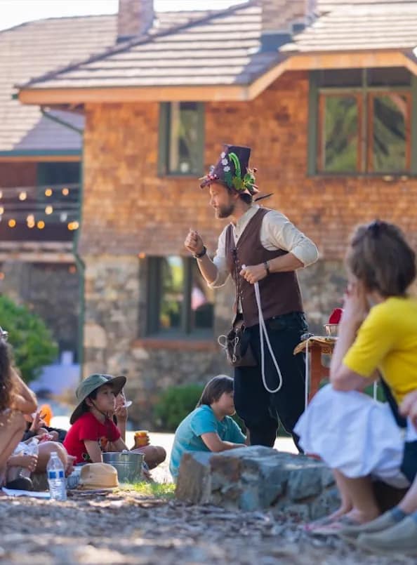Community magic show on the North Star House grounds