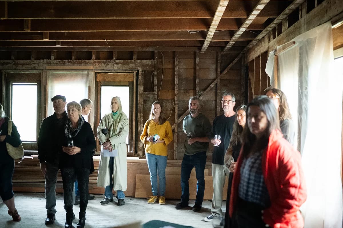 Creative Community Upstairs Discussing Ideas