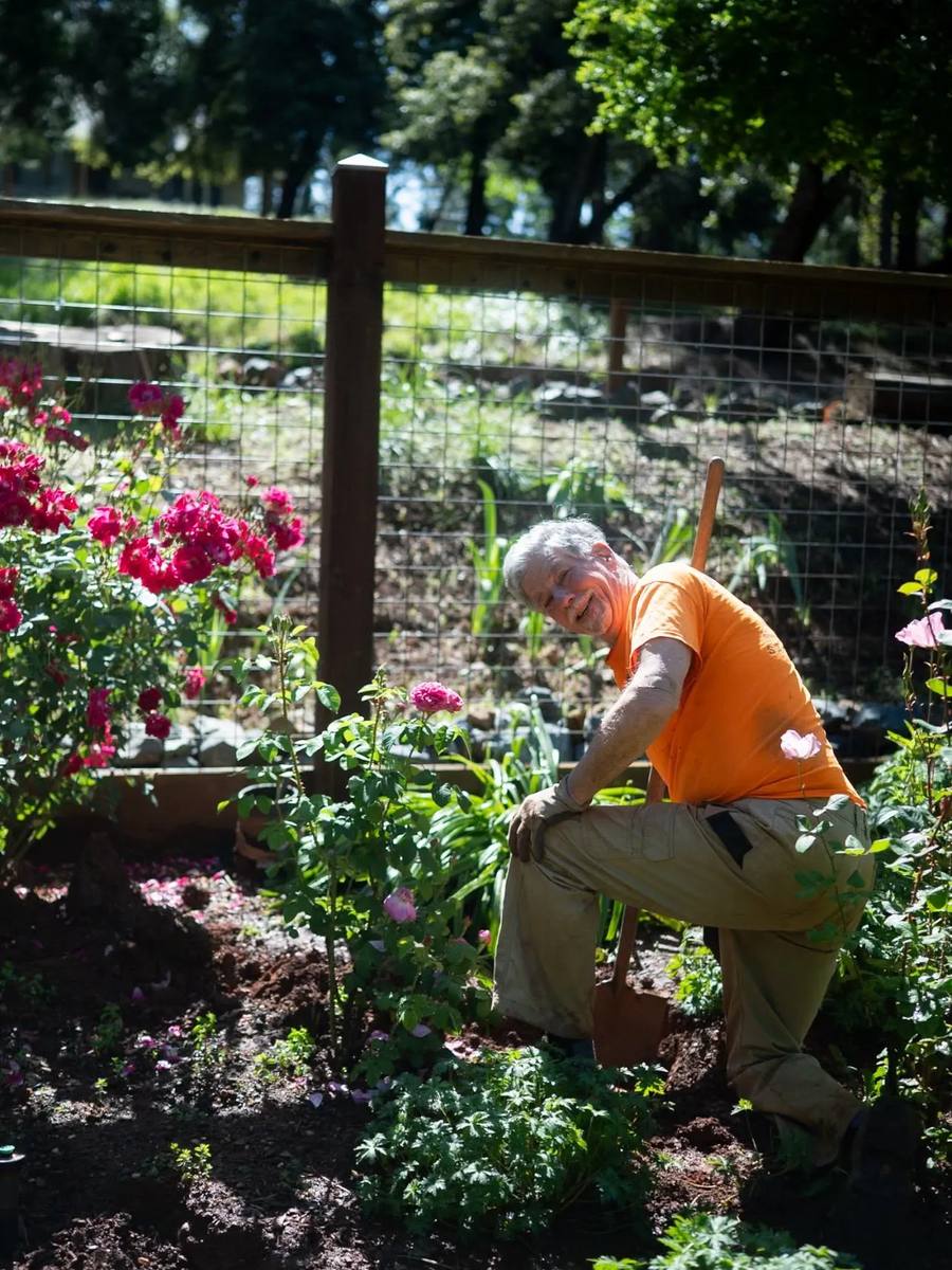 Volunteer Bob Parker working in the garden