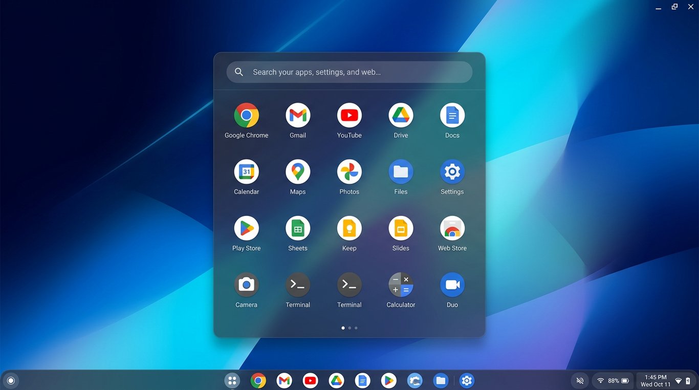 Desktop do ChromeOS com o menu de aplicativos centralizado. O fundo é um papel de parede abstrato em tons de azul.