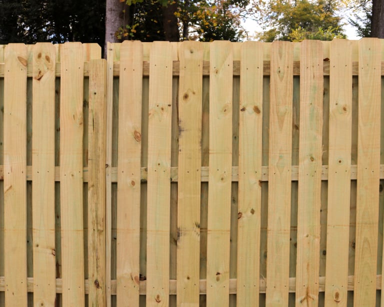 Shadowbox fence staining
