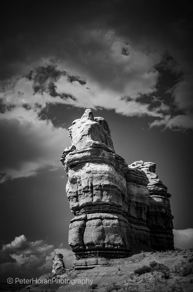 11Peter_HoranRed-Rocks.-White-Cluds