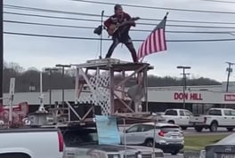 Man shows patriotism while playing music