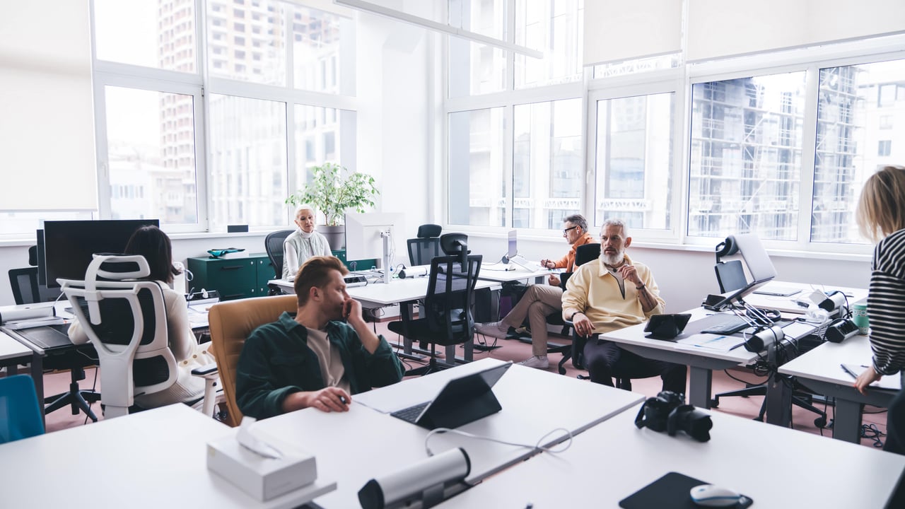 Office demand is stabilizing, but hybrid peak days and open-plan friction are breaking the experience.