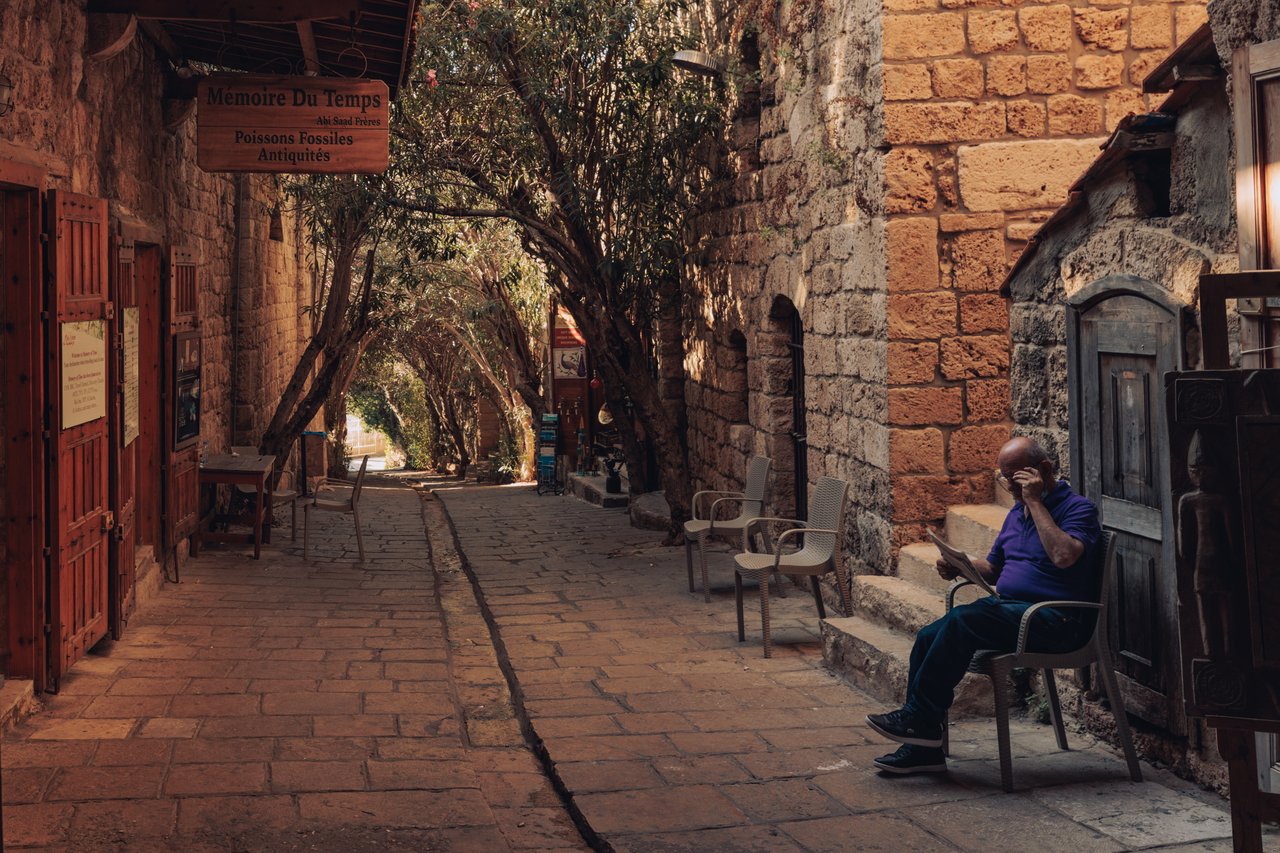 A graffiti-covered interior with a painting reading 'Don't live your life blindfolded', Beirut