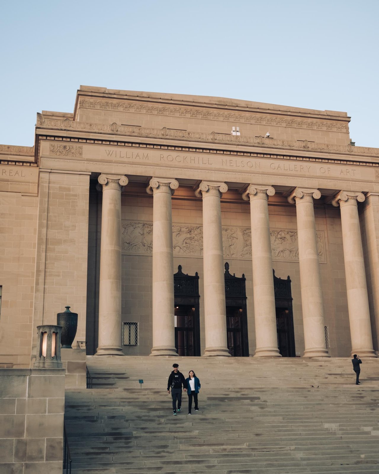 The columned facade of the Nelson-Atkins Museum, people on the steps, Kansas City