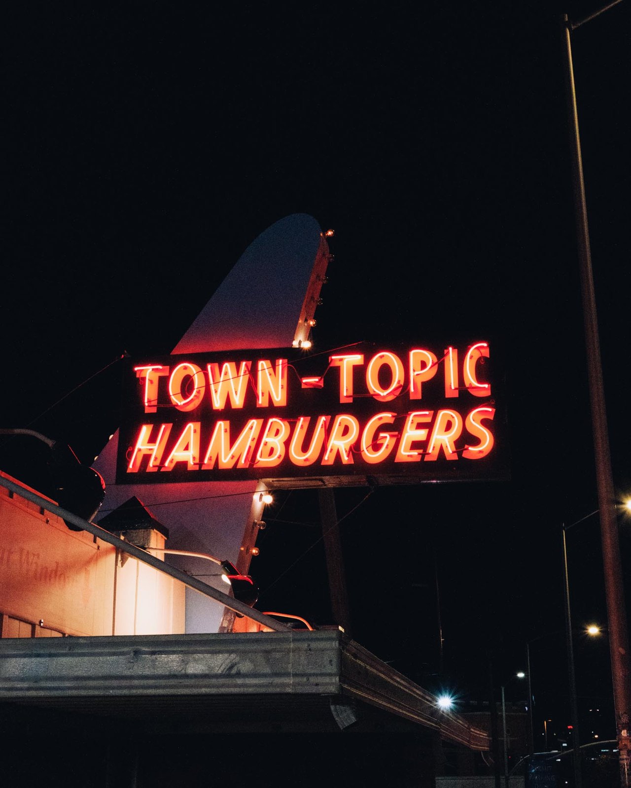 The classic 'Town Topic Hamburgers' neon sign at night, Kansas City