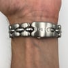 Back View Of Screwback Back Case And Closed Stainless Steel Band Of BERTOLUCCI 123 41 Watch Pre Owned Condition