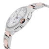 An image of a pre-owned Cartier men's wristwatch in a side profile view, highlighting the crown. The watch features a round shape with a silver dial, steel bezel, and a bracelet made of stainless steel and solid gold. It displays luxury and dress/formal style, including a chronograph, date indicator, and small seconds subdial. The crown is visible on the right side of the watch case, which is positioned at a slight angle to showcase the side details and the midsection of the band, with the camera at a close, but clear distance for detailed viewing.