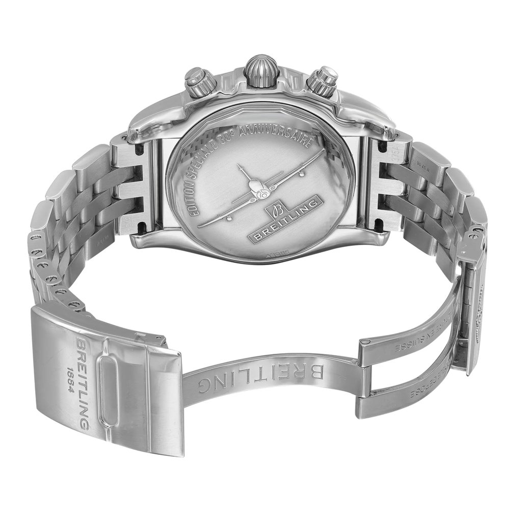 An image of a pre-owned Breitling men's wristwatch showcasing the back view with an open clasp. The watch features a round stainless steel case and band with a screwback caseback that includes engraved text. The fold-over clasp with flip lock safety is partially extended, and the watch is positioned at a slight angle to the camera, allowing visibility of the band's links and the caseback's details. The distance is close-up, providing a clear view of the watch's condition and design. The watch has minor dings on the lugs and minor nicks on the back case.