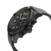 An image of a wristwatch in a side profile view, highlighting the crown and buttons. The watch has a textured black strap and a detailed black dial with white numerals. The angle showcases the rugged design and intricate features of the watch, indicating it's a display model. The image is taken at a close distance, emphasizing the craftsmanship and materials.