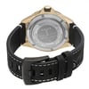 An image of a wristwatch seen from the back view, showcasing the close clasp. The watch is positioned upright, highlighting its round case and visible engravings on the backplate. The angle captures the gold-toned case and the textured black leather strap with white stitching. The image is taken from a close distance, emphasizing the details of the display model's design and craftsmanship.