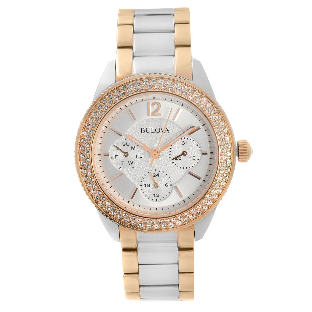 An image of a Wristwatch by Bulova. This Pre Owned item is designed for Women, featuring a Dress/Formal style. It has a Quartz movement and an Analog display with a Silver dial color. The indices include 12-Hour Dial,Arabic Numerals,Multi Dial,Stick Indexes. The band is made of Stainless Steel and the case is made of Stainless Steel. The watch has a Round shape with a case size of 38 mm and a case thickness of 9 mm.