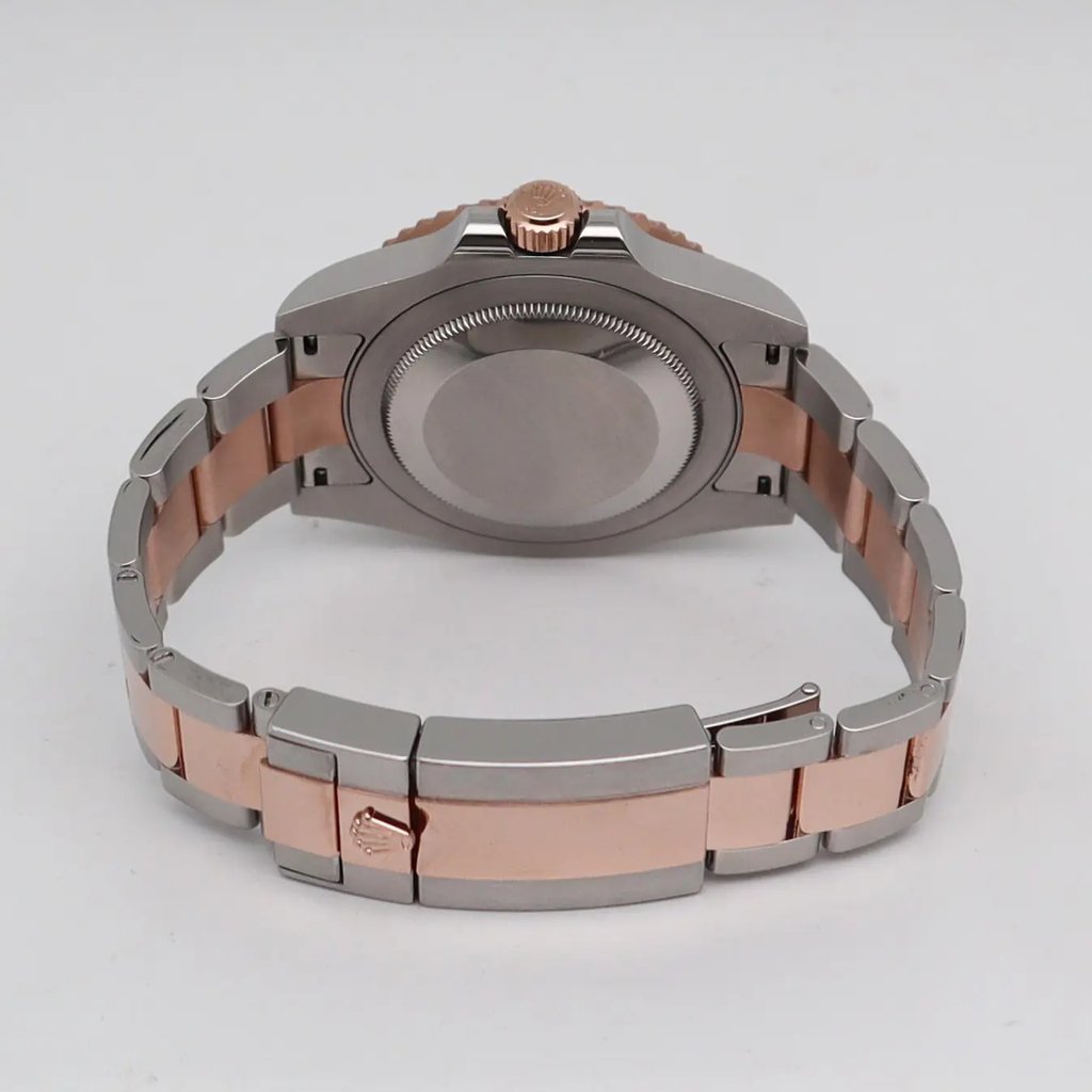Back View Of Solid Back Case And Closed Stainless Steel,Rose Gold Band Of Rolex 126711CHNR Watch Pre Owned Condition