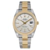 An image of a men's Rolex Oyster Perpetual Datejust wristwatch in unworn condition with a luxury style. The front full frontal view shows a round watch face with a sunburst silver dial, gold bezel, and a date indicator at the 3 o'clock position. The watch features luminous hands, stick indexes for the hours, and is certified as a superlative chronometer. The stainless steel and yellow gold band is captured from a direct angle, displaying the watch in its entirety from a medium distance, providing a clear view of its excellent condition and details.