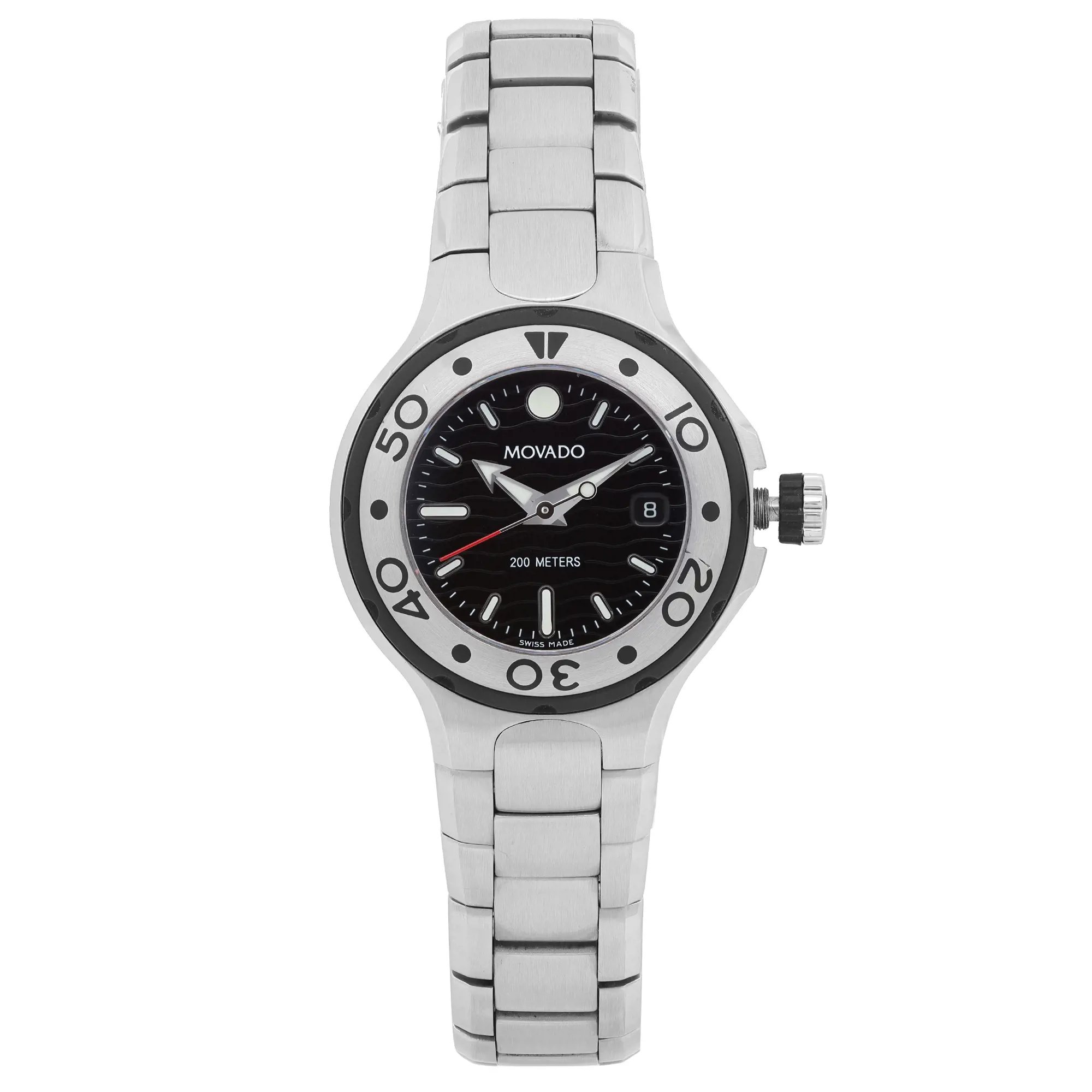 An image of a pre-owned wristwatch taken from a front full frontal view. The watch features a stainless steel band and a round bezel with numerical markings. The dial is black with silver hands and a date window. The brand name is visible on the dial. The image captures the watch from a close distance, highlighting its details and condition.