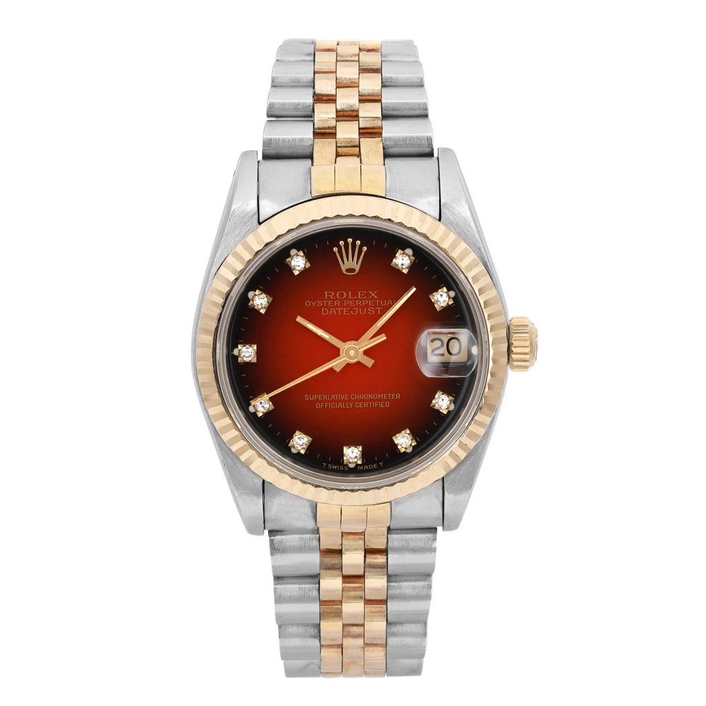 An image of a pre-owned wristwatch captured from a front full frontal view. The watch features a two-tone metal bracelet and a round face with a date display. The dial has a gradient design with hour markers and is set within a bezel. The crown is positioned on the right side. The image is taken from a close distance, highlighting the details of the watch's face and bracelet.