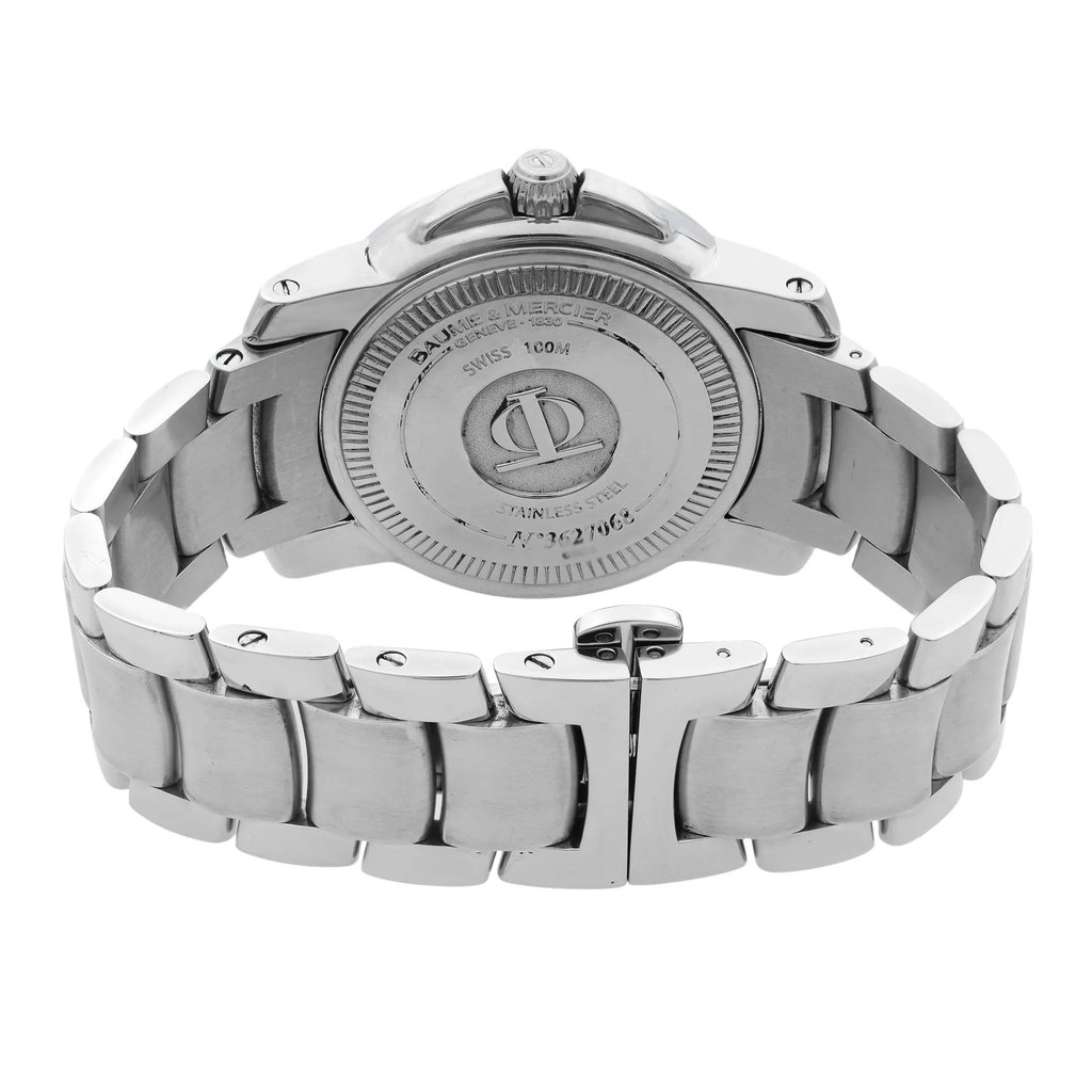 An image of a pre-owned wristwatch captured from the back view, showcasing the closed clasp. The angle highlights the stainless steel bracelet and the engraved details on the back case, with the watch positioned at a slight upward angle. The photograph is taken from a close distance, emphasizing the craftsmanship and condition of the watch.