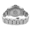 An image of a pre-owned wristwatch captured from the back view, showcasing the closed clasp. The angle highlights the stainless steel bracelet and the engraved details on the back case, with the watch positioned at a slight upward angle. The photograph is taken from a close distance, emphasizing the craftsmanship and condition of the watch.
