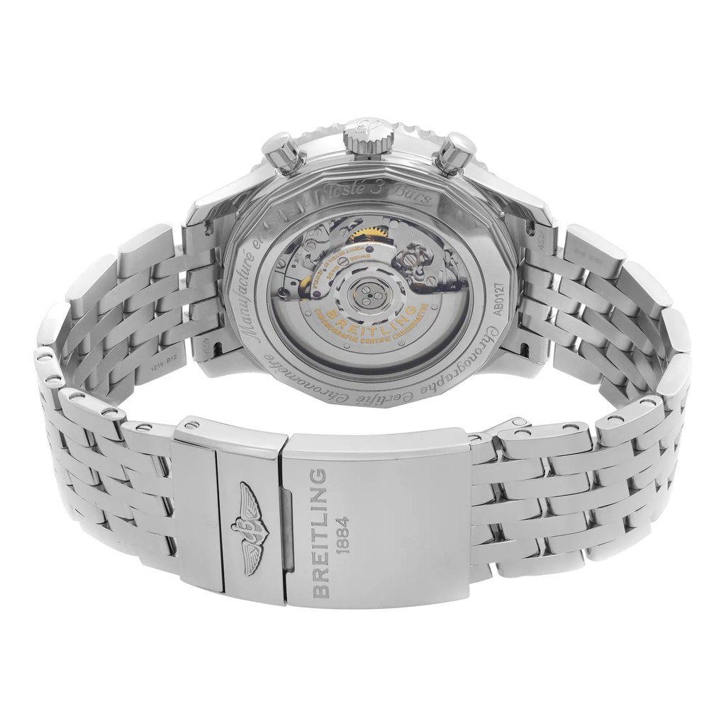 An image of a Breitling men's wristwatch, display model, with a stainless steel case and band, viewed from the back. The exhibition caseback showcases the watch's internal mechanism at a direct angle. The round watch shape is centered, with a fold-over clasp visible in the foreground and the watch is positioned at a medium distance from the viewer, allowing clear visibility of the details. The watch is a display model and may show minor blemishes due to store handling.
