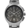 An image of a new wristwatch captured from a front close-up angle, highlighting the watch face. The watch features a metallic band and a sleek, dark dial with silver-tone hands and markers. The brand name is visible on the upper center of the dial, with sub-dials for additional functionality and a date window at the bottom. The overall design is modern and elegant.