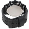 An image of a Fossil wristwatch taken from the back at a slightly elevated angle and close distance. The focus is on the stainless steel case back, with the black leather strap and buckle visible. The watch is new but noted to have defects.
