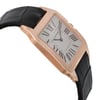 An image of a pre-owned wristwatch viewed from the side profile, opposite the crown. The watch features a rectangular case with a rose gold tone, showcasing a white dial with black Roman numerals. The black leather strap is visible, positioned at an angle, highlighting the elegant design. The image is taken at a close distance, emphasizing the watch's details and craftsmanship.
