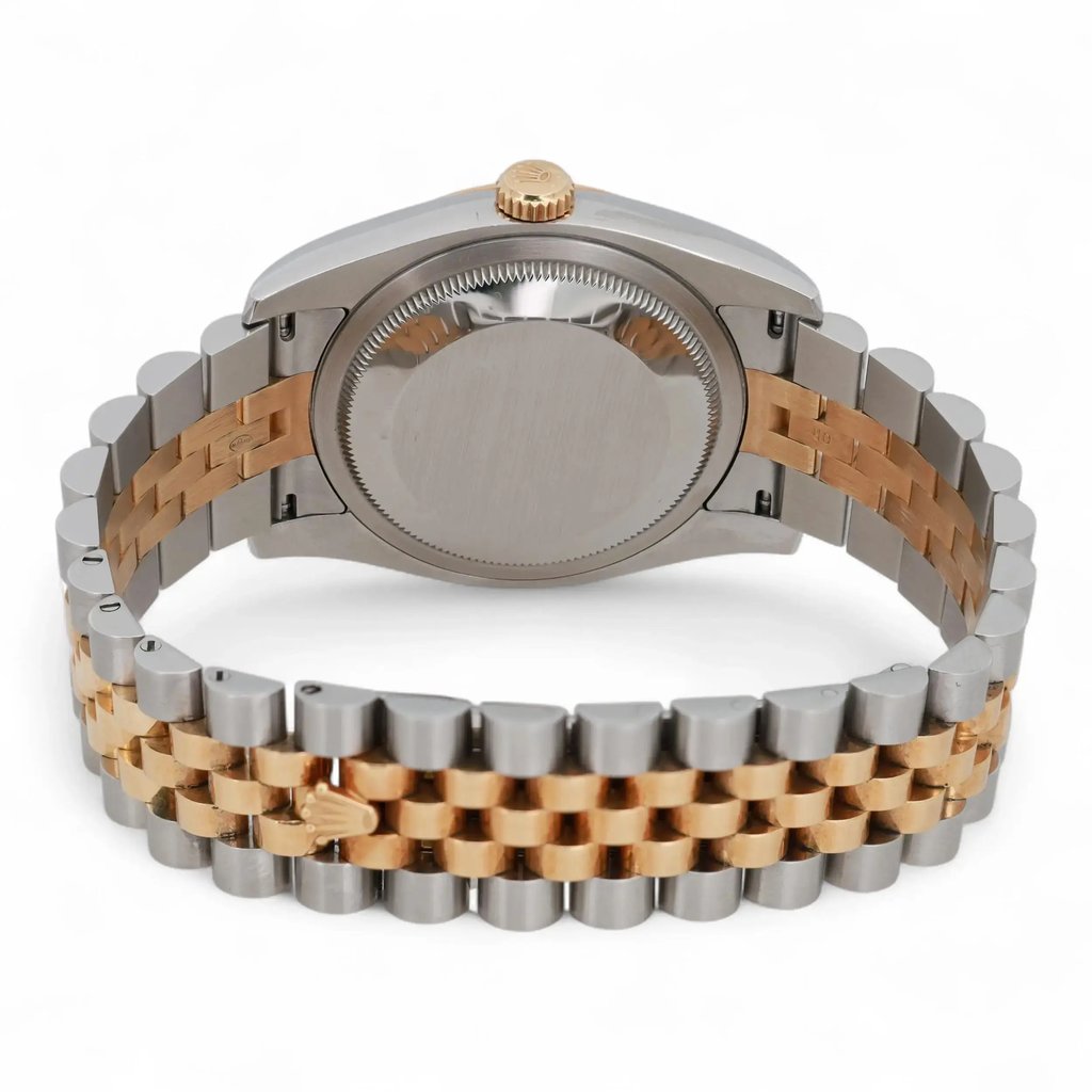 An image of a pre-owned men's Rolex wristwatch, viewed from the rear at a slight angle. The focus is on the back of the watch case and the two-tone metal bracelet, featuring a combination of stainless steel and gold links. The watch is positioned upright with the crown visible at the top, showcasing the craftsmanship and design of the bracelet.
