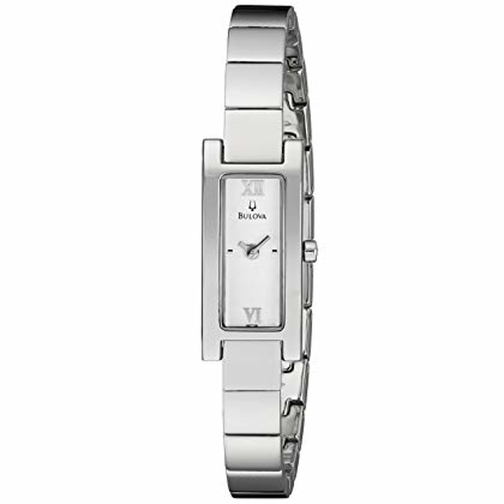 An image of a pre-owned Bulova women's wristwatch, presented in a front full frontal view. The dial is gray and silver with a mixture of Roman numerals at the quarters and stick indexes for the other hour marks. The round watch face is set within a rectangular steel case, and the bezel is also steel. The steel band material complements the case and bezel, providing a sleek, dress/formal style. The watch is depicted from a close distance, offering a clear view of its design and condition.