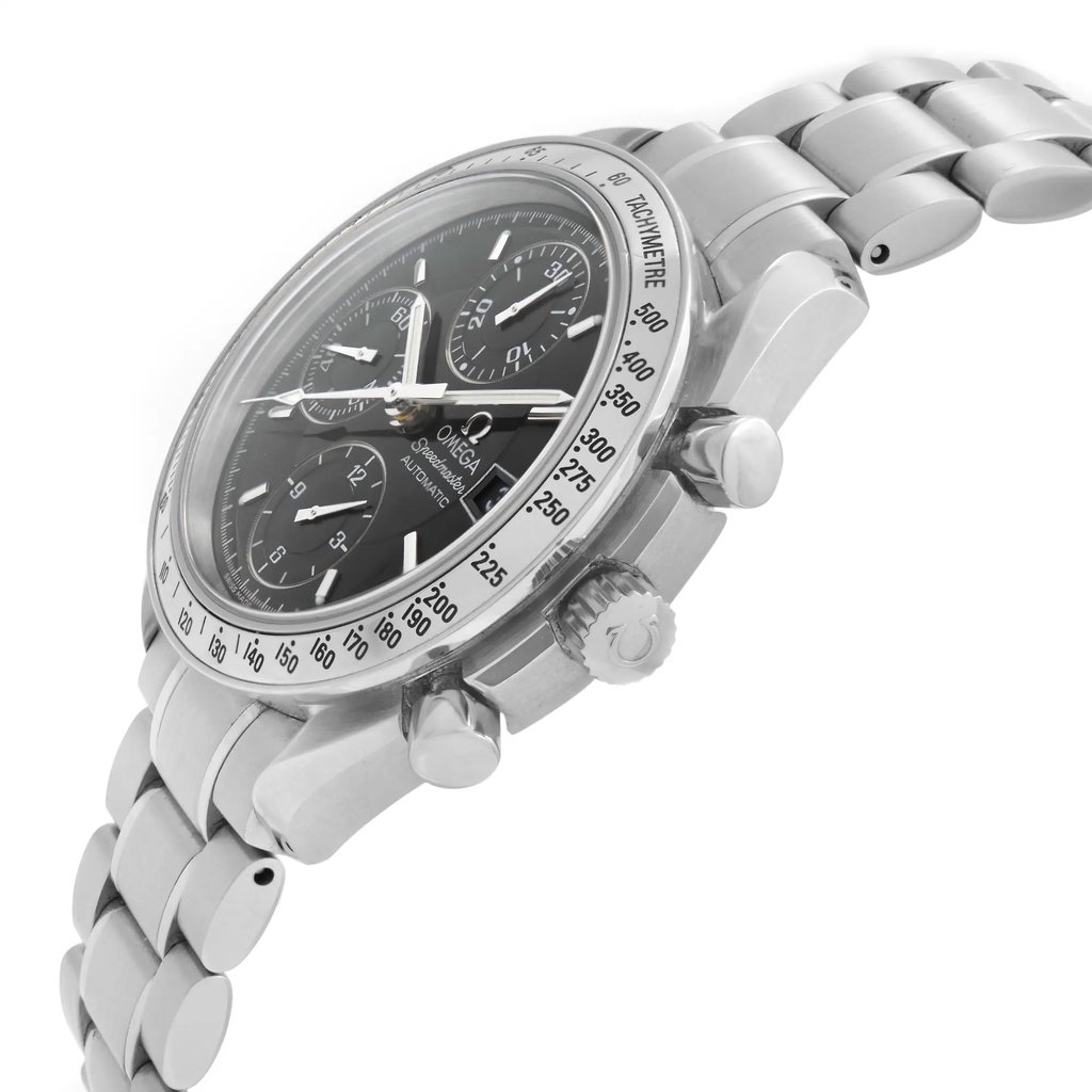 An image of a pre-owned wristwatch captured from a side profile view, focusing on the crown and showcasing the watch's detailed design. The angle highlights the stainless steel bracelet and the intricately marked tachymeter bezel. The watch face is visible, displaying multiple sub-dials, with the overall shot taken at a close distance to emphasize the craftsmanship.