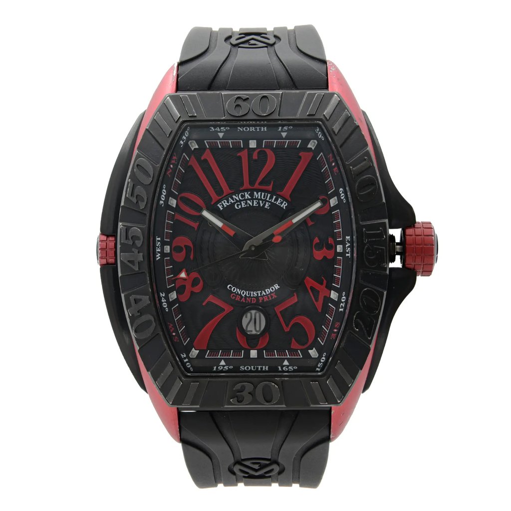 An image of a Wristwatch by Franck Muller. This Pre Owned item is designed for Men, featuring a Sport style. It has a Mechanical (Automatic) movement and an Analog display with a Multicolor dial color. The indices include 12-Hour Dial,Arabic Numerals,Easy to Read/Large Numerals. The band is made of Rubber and the case is made of Titanium. The watch has a Tonneau/Barrel shape with a case size of 47 mm and a case thickness of 15 mm.
