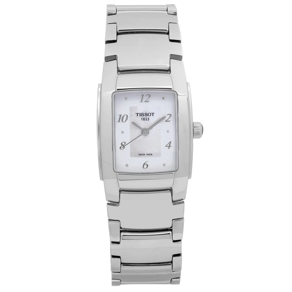 An image of a Tissot wristwatch, positioned front and center, facing directly towards the viewer. The watch features a rectangular silver case with a Mother Of Pearl dial, marked with black numerals at 12, 2, 4, 6, 8, and 10 o'clock positions. It has silver hands and a Tissot logo just below the 12 o'clock marker. Case and bracelet are stainless steel. Display model in excellent condition. 
