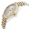 An image of an unworn Rolex men's luxury wristwatch in excellent condition, presented in a side profile view with the crown visible. The watch features a round dial in silver color, framed by a yellow gold bezel. It has a two-tone band combining yellow gold and stainless steel. The watch is shown at a close distance, providing clear visibility of its details and craftsmanship.
