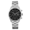 An image of a pre-owned TAG Heuer men's wristwatch in good condition, presented in a full frontal view. The watch features a casual style with a round stainless steel case and a matching stainless steel band. The black dial is complemented by a gray bezel, Arabic numerals, and 12-hour dial indices. It is equipped with a chronograph, date indicator, and a small seconds subdial. The watch is positioned centrally, shot from a direct angle, and fills the frame, providing a clear view of its details. Minor blemishes may be present due to handling and shipping.
